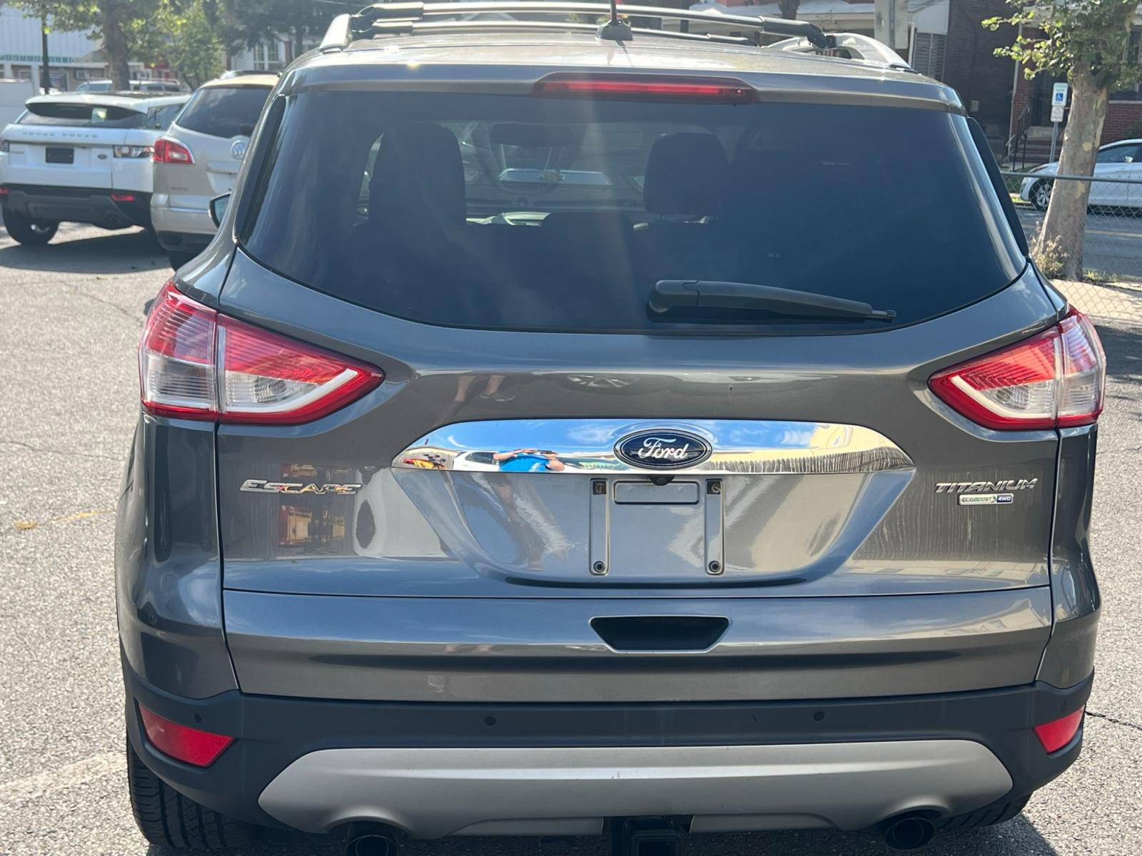 2014 GRAY /gray leather Ford Escape (1FMCU9J92EU) , located at 1018 Brunswick Ave, Trenton, NJ, 08638, (609) 989-0900, 40.240086, -74.748085 - A really nice Ford Escape here! Loaded up with lots of options and Leather interior! A super clean vehicle and ready for its next owner! - Photo #2